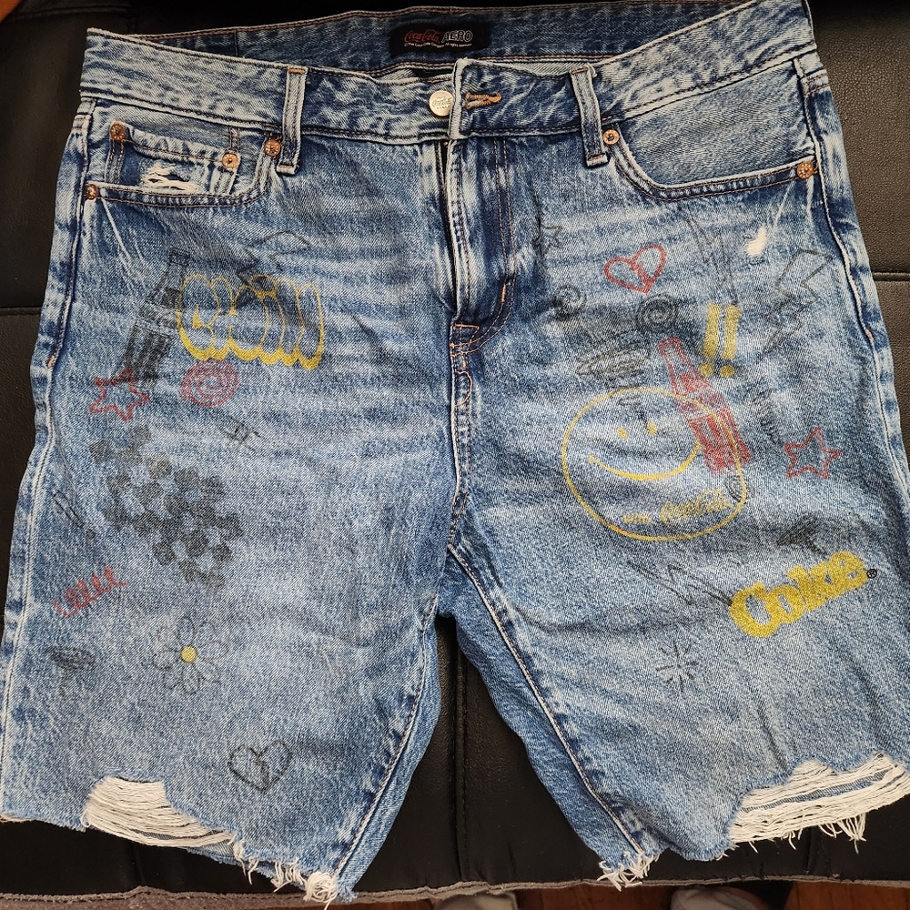 Coca Cola Stylish Blue Denim Shorts with Graphic Design.  Lose Shorts Size 32